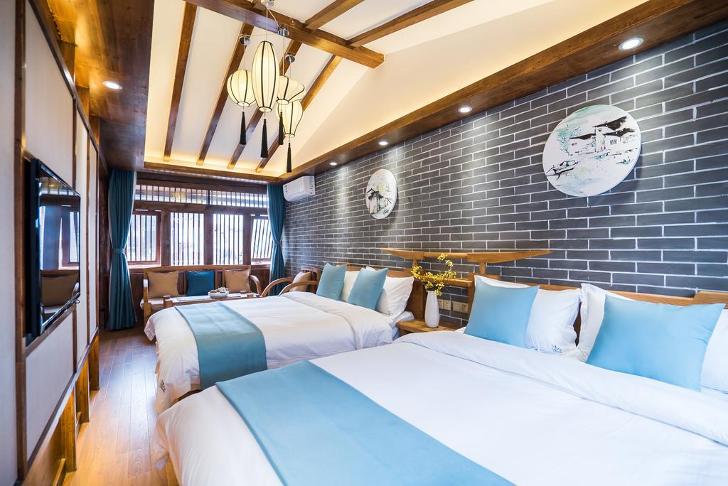 Lijiang Yue Tu Inn Exteriör bild