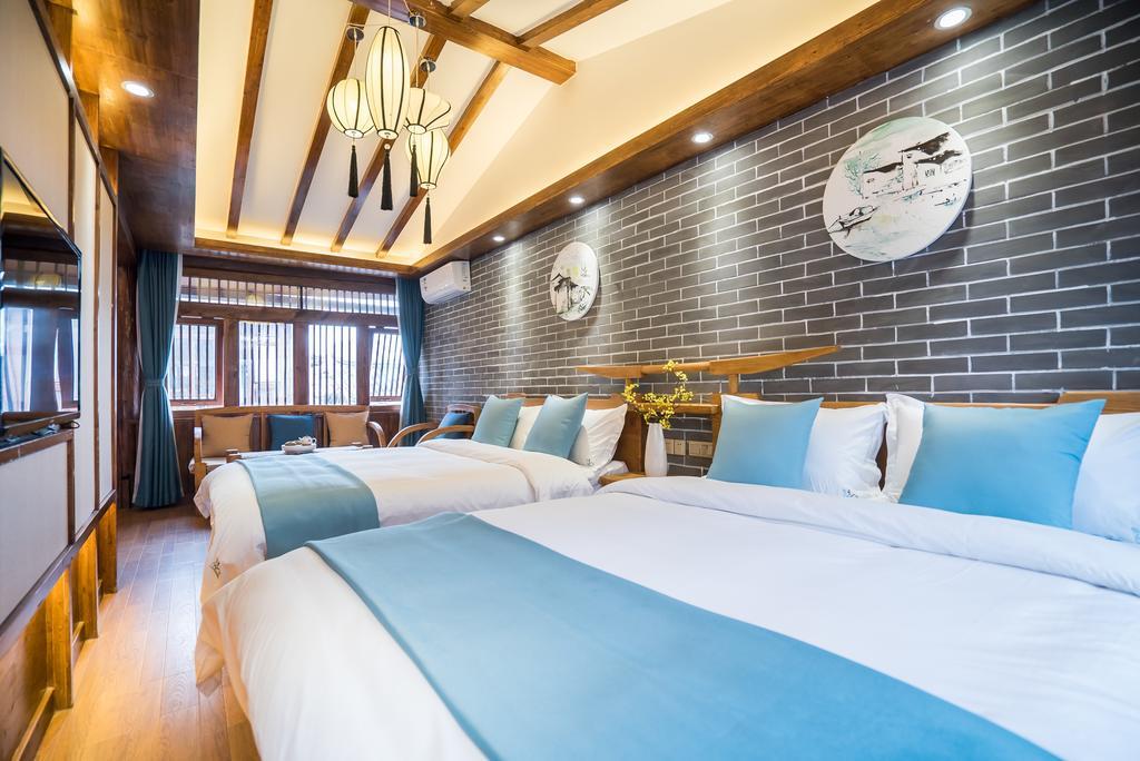 Lijiang Yue Tu Inn Exteriör bild